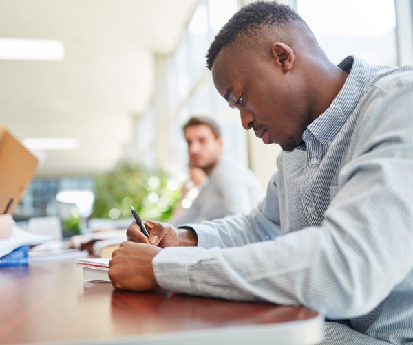 adult learner writing