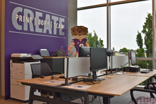 A person standing in an office

AI-generated content may be incorrect.